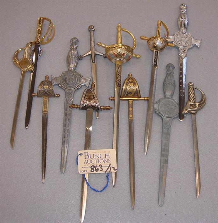 Appraisal: Lot of vintage sword shaped souvenir letter openers Longest letter