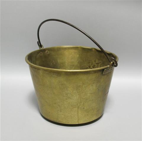 Appraisal: BRASS BUCKET Worn mark on base with iron swing handle