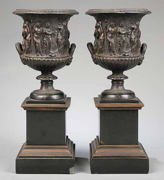 Appraisal: A Pair of Continental Patinated Composite Stone Campagna-Form Urns th