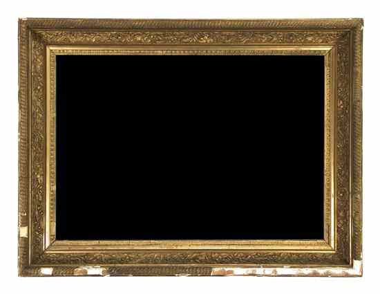 Appraisal: A Victorian Giltwood Mirror having a rectangular plate within a