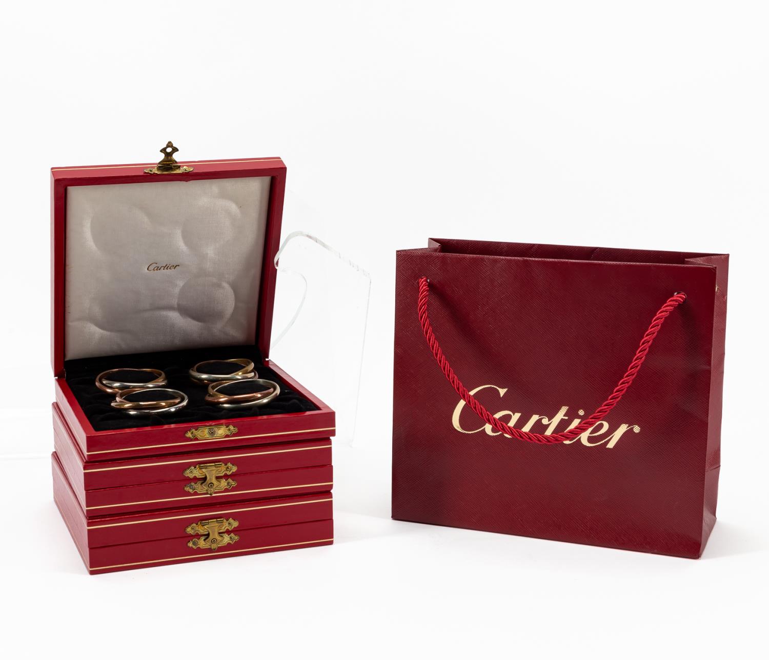 Appraisal: SET OF CARTIER TRINITY NAPKIN RINGS Set of twelve Cartier