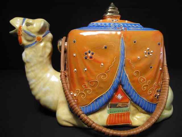 Appraisal: Colorful figural teapot in the form of a camel Made