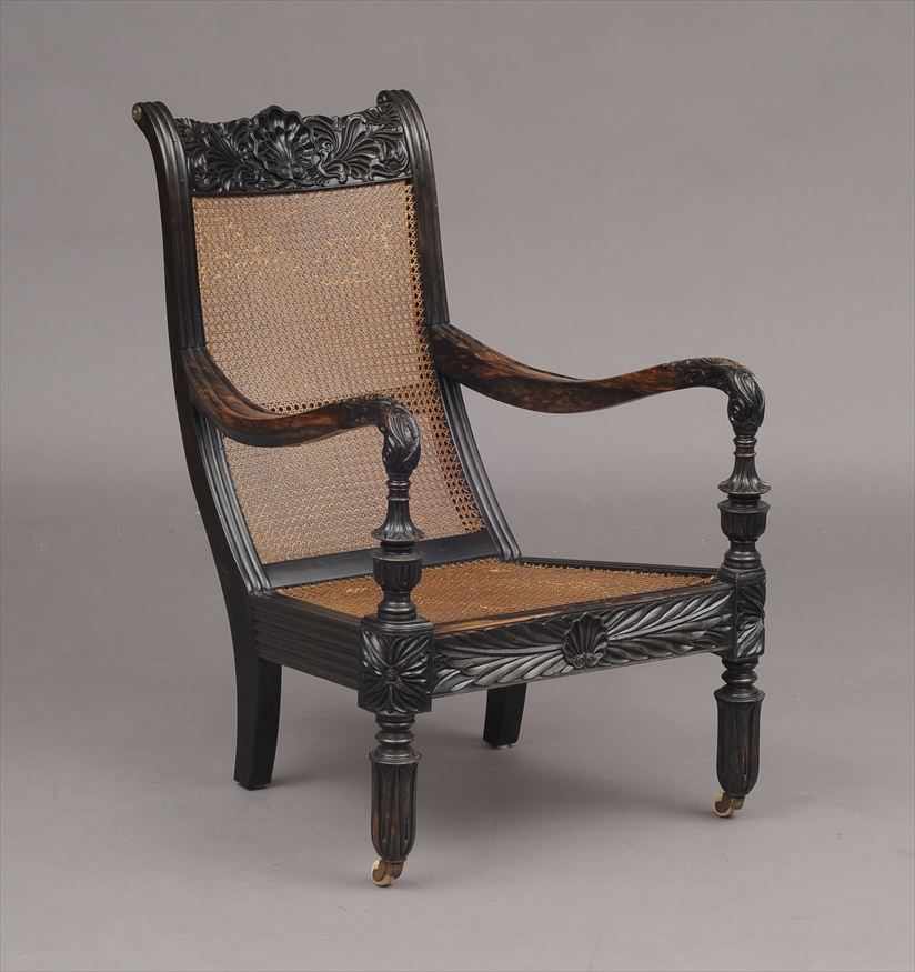 Appraisal: ANGLO-INDIAN CARVED EBONY ARMCHAIR x x in