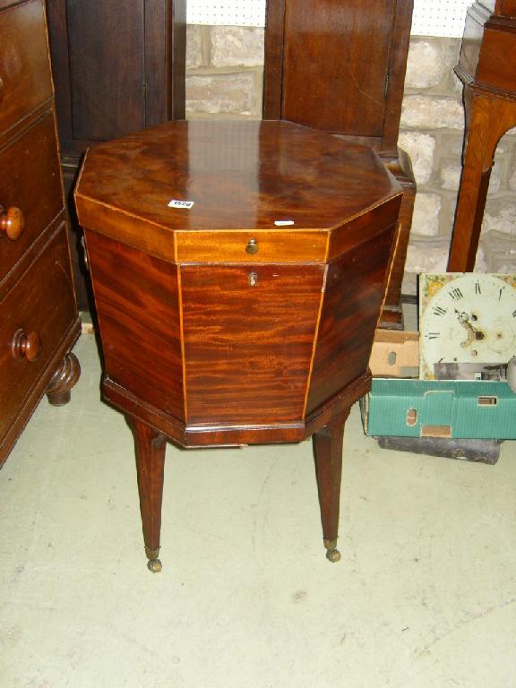 Appraisal: A George III mahogany wine cooler of tapering octagonal form