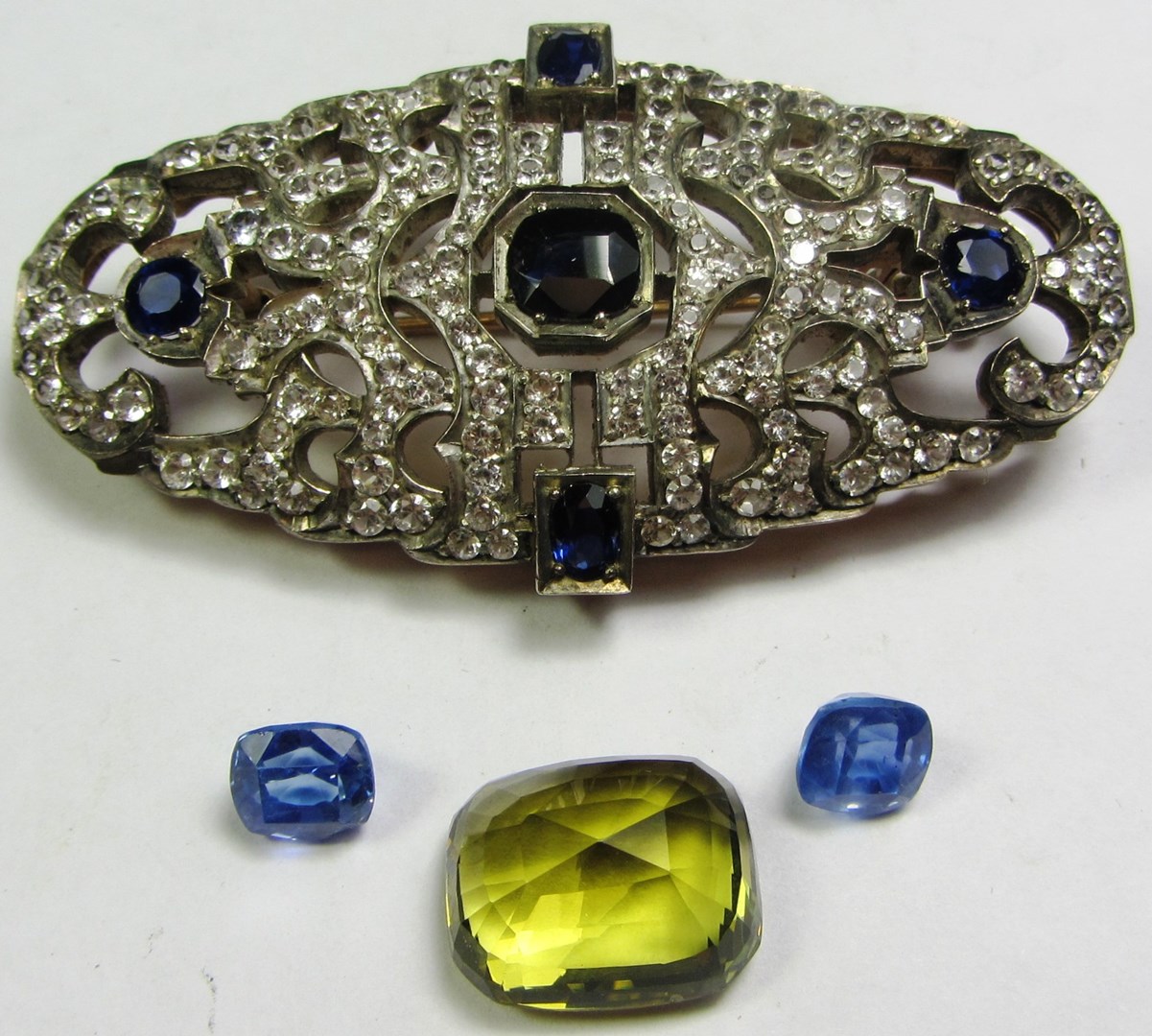 Appraisal: A sapphire and colourless gem set brooch in a pierced