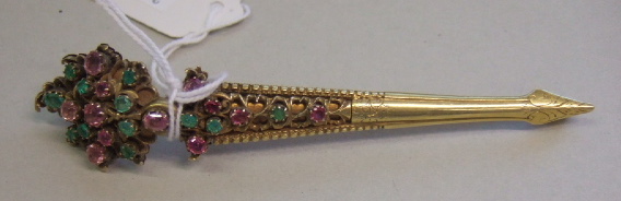 Appraisal: A silver gilt emerald and ruby set turban pin mounted