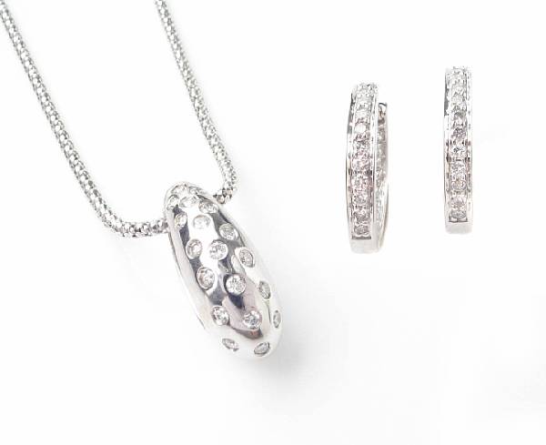 Appraisal: A collection of diamond and white gold jewelry including a