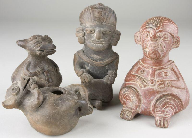 Appraisal: Four Pre-Columbian Style Effigy Pots Ecuador the first of a