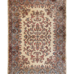 Appraisal: A Kirman Wool Rug Mid- th Century feet x feet