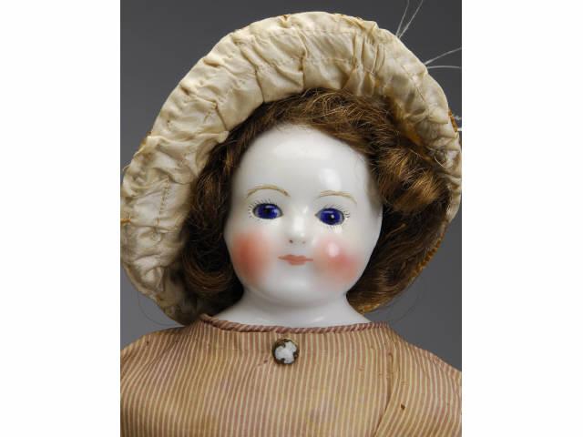 Appraisal: China Lady Doll France ca early glazed porcelain shoulder head