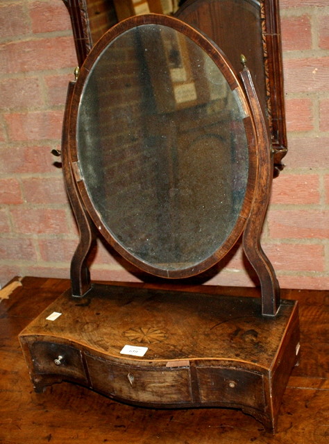 Appraisal: A GEORGE III SERPENTINE FRONTED BOX TOILET MIRROR with an