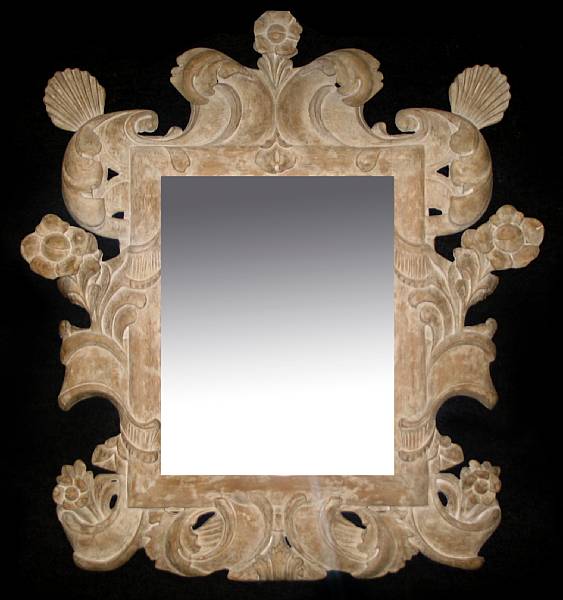 Appraisal: A Rococo style carved limed wood mirror height ft in