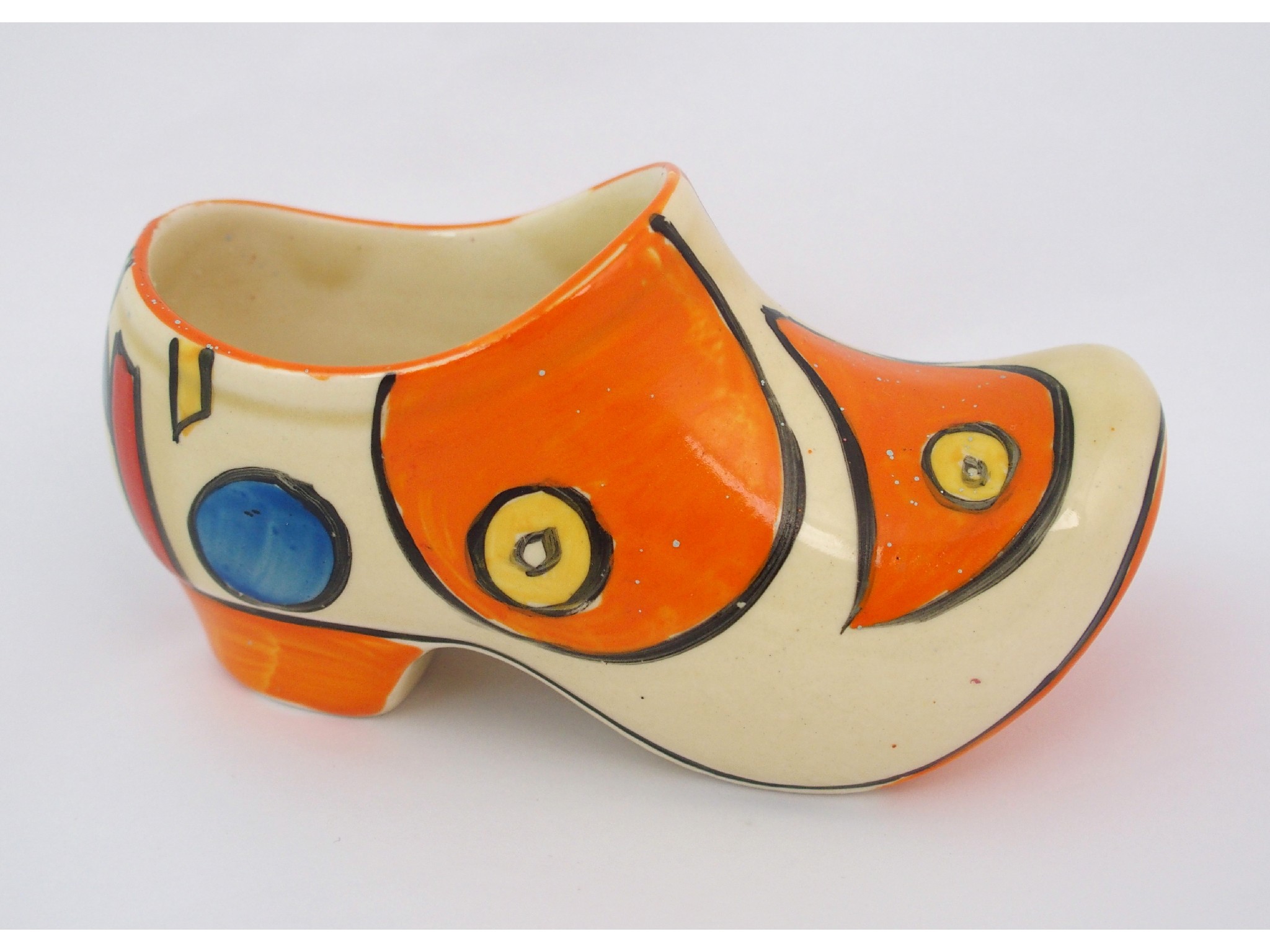 Appraisal: A Clarice Cliff Bizarre Orange Battle pattern porcelain clogcirca painted