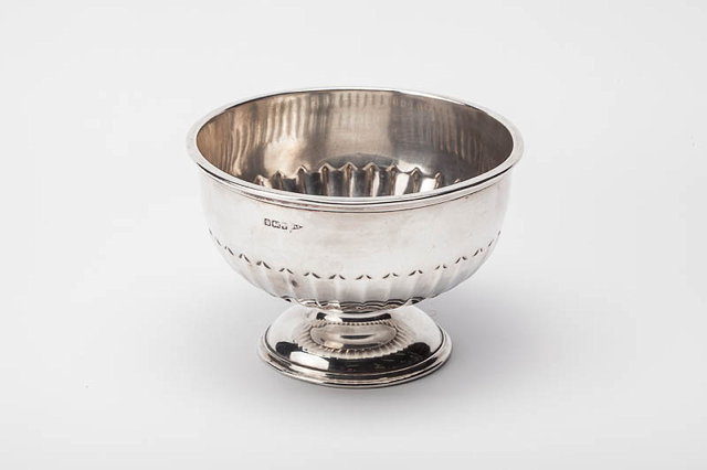 Appraisal: A WALKER HALL SHEFFIELD SILVER PEDESTAL BOWL with half fluted