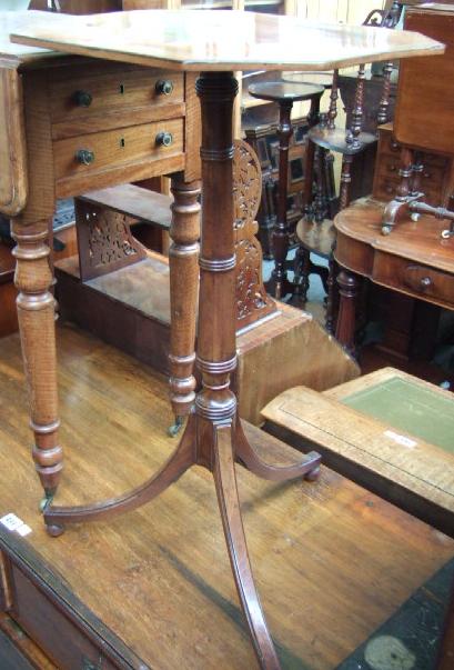 Appraisal: A late George III mahogany and rosewood banded snap top