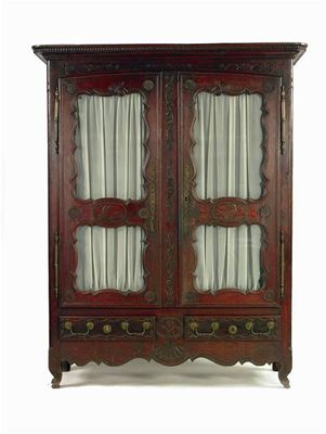 Appraisal: An early th century French provincial carved oak armoire the