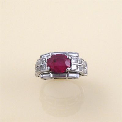 Appraisal: A ruby and diamond ring c the oval shape ruby