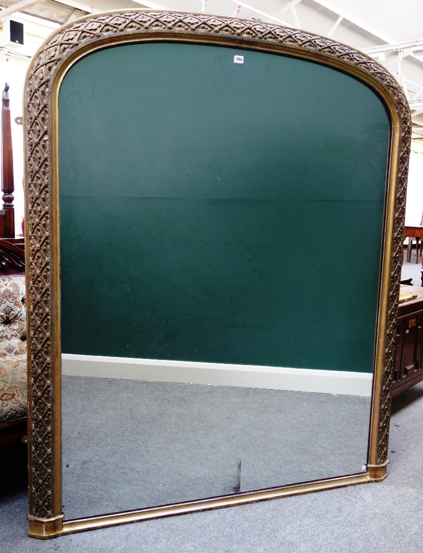 Appraisal: A Victorian gilt framed arch top overmantel mirror the frame