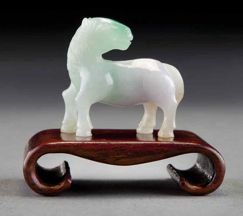 Appraisal: Chinese Qing carved jadeite horse Jade ''H Circa - th