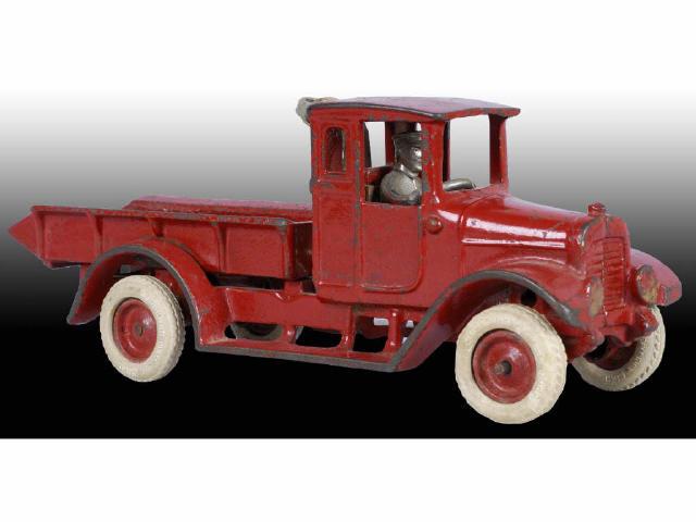 Appraisal: Cast Iron Arcade Red Baby Dump Truck Toy Description Red