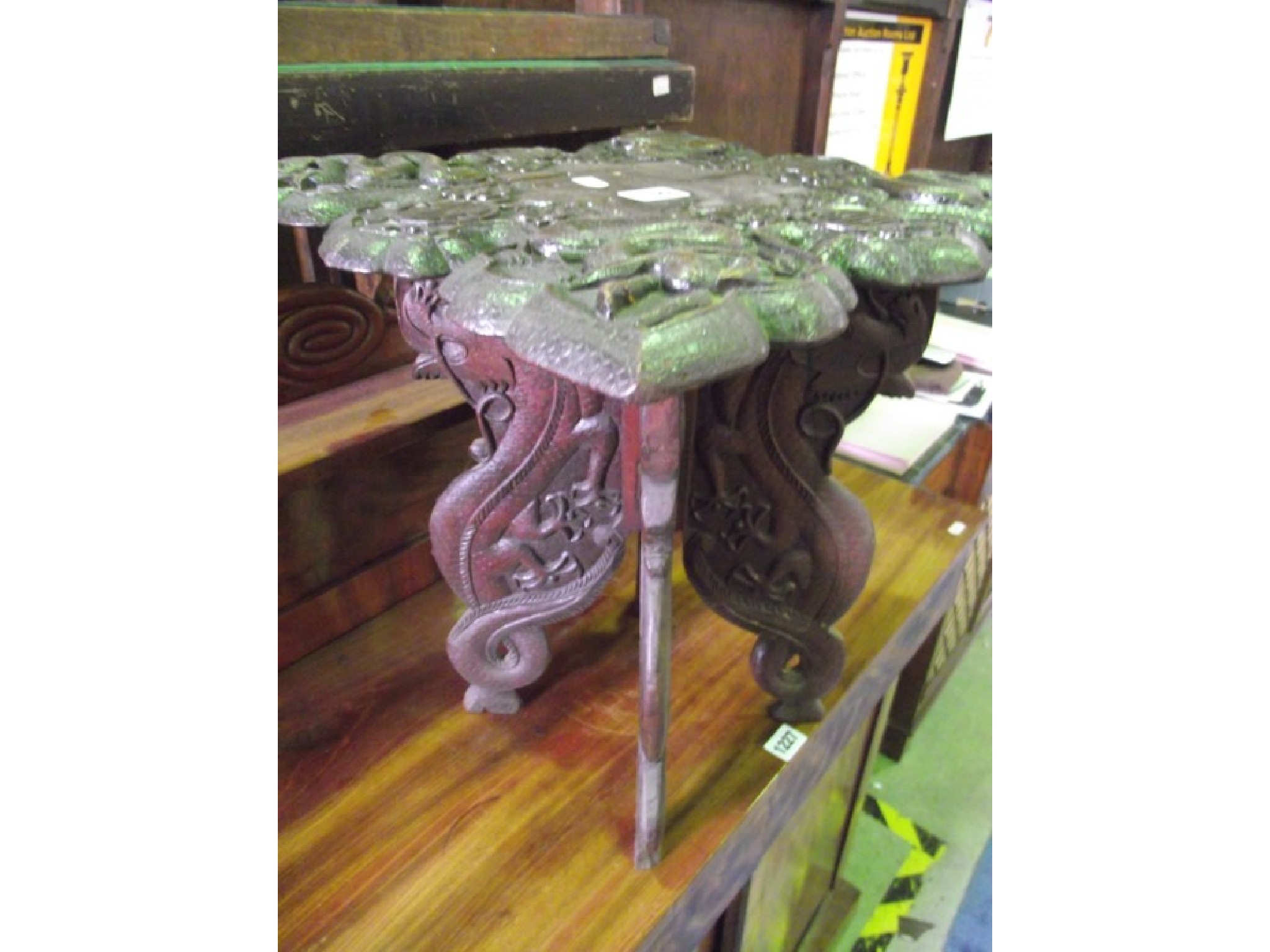 Appraisal: A small Chinese hardwood occasional table with profusely carved and