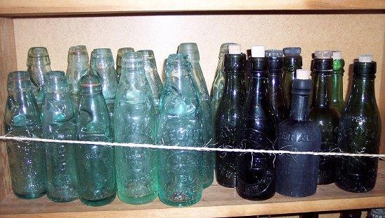 Appraisal: A collection of lemonade and other glass bottles