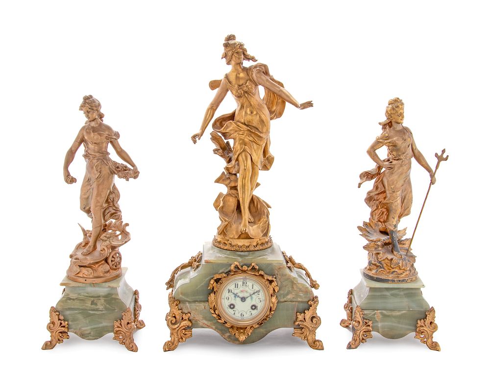 Appraisal: A French Onyx and Gilt Metal Clock Garniture A French