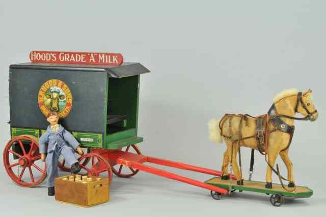 Appraisal: SCHOENHUT HOOD'S DAIRY WAGON Very desirable enclosed horse drawn wagon