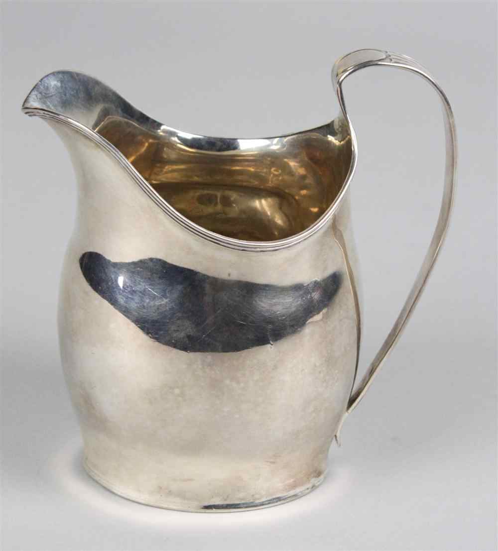 Appraisal: ENGLISH SILVER CREAM PITCHER circa London of everted helmet shape