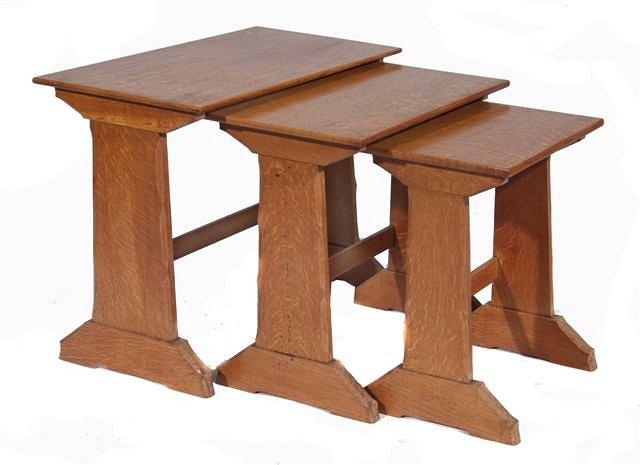 Appraisal: A NEST OF THREE ARTS AND CRAFTS STYLE OAK TABLES