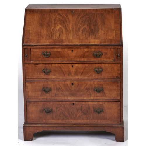 Appraisal: A walnut bureau mid th c in George II style