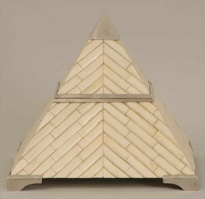 Appraisal: TH C CHROME-MOUNTED FAUX IVORY PYRAMID-FORM HUMIDOR The hinged opening