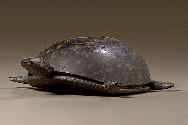 Appraisal: FOLK ART CARVED AND PAINTED TURTLE American mid- to late