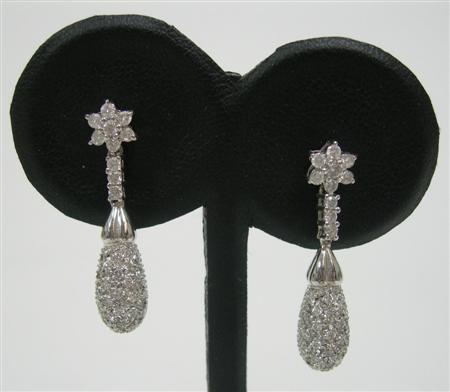 Appraisal: A pair of ct white gold mounted diamond pendant earrings