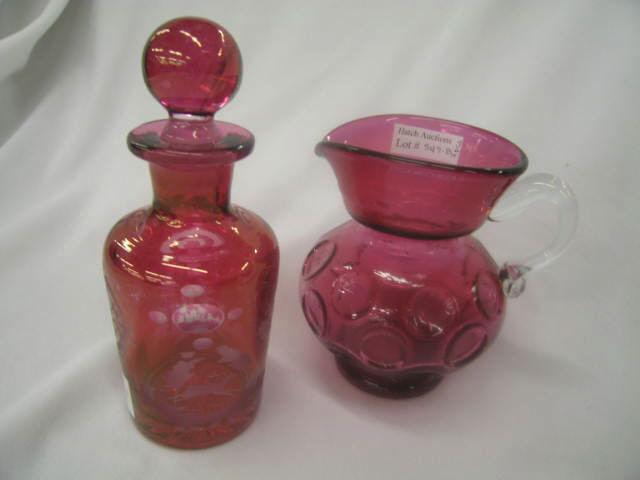 Appraisal: Pcs Cranberry Art Glass cologne bottle and milk pitcher