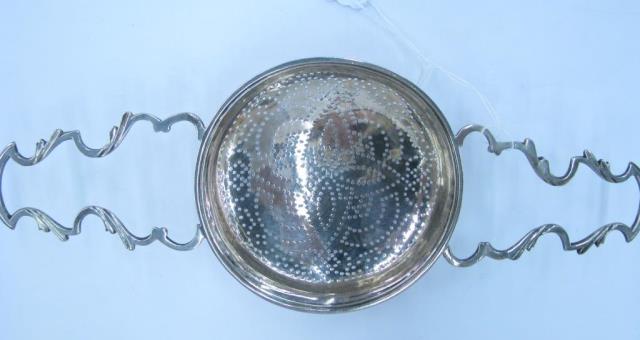 Appraisal: George II English sterling punch strainer period antique long slight