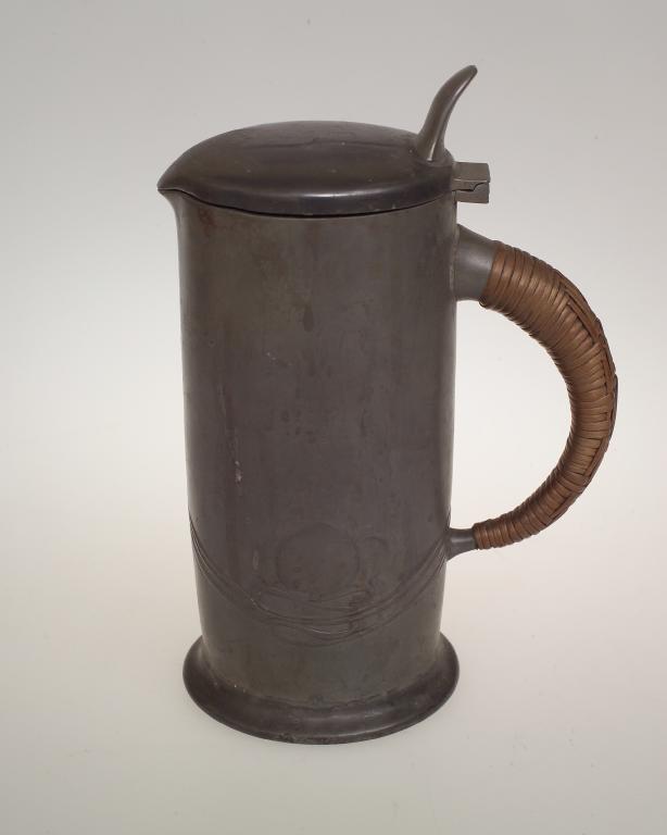 Appraisal: LIBERTY CO ENGLISH PEWTER COVERED JUG DESIGNED BY ARCHIBALD KNOX