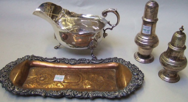 Appraisal: A silver baluster shaped castor on a circular foot London