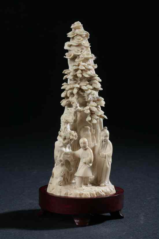 Appraisal: CHINESE IVORY FIGURAL GROUP Carved to depict two figures under