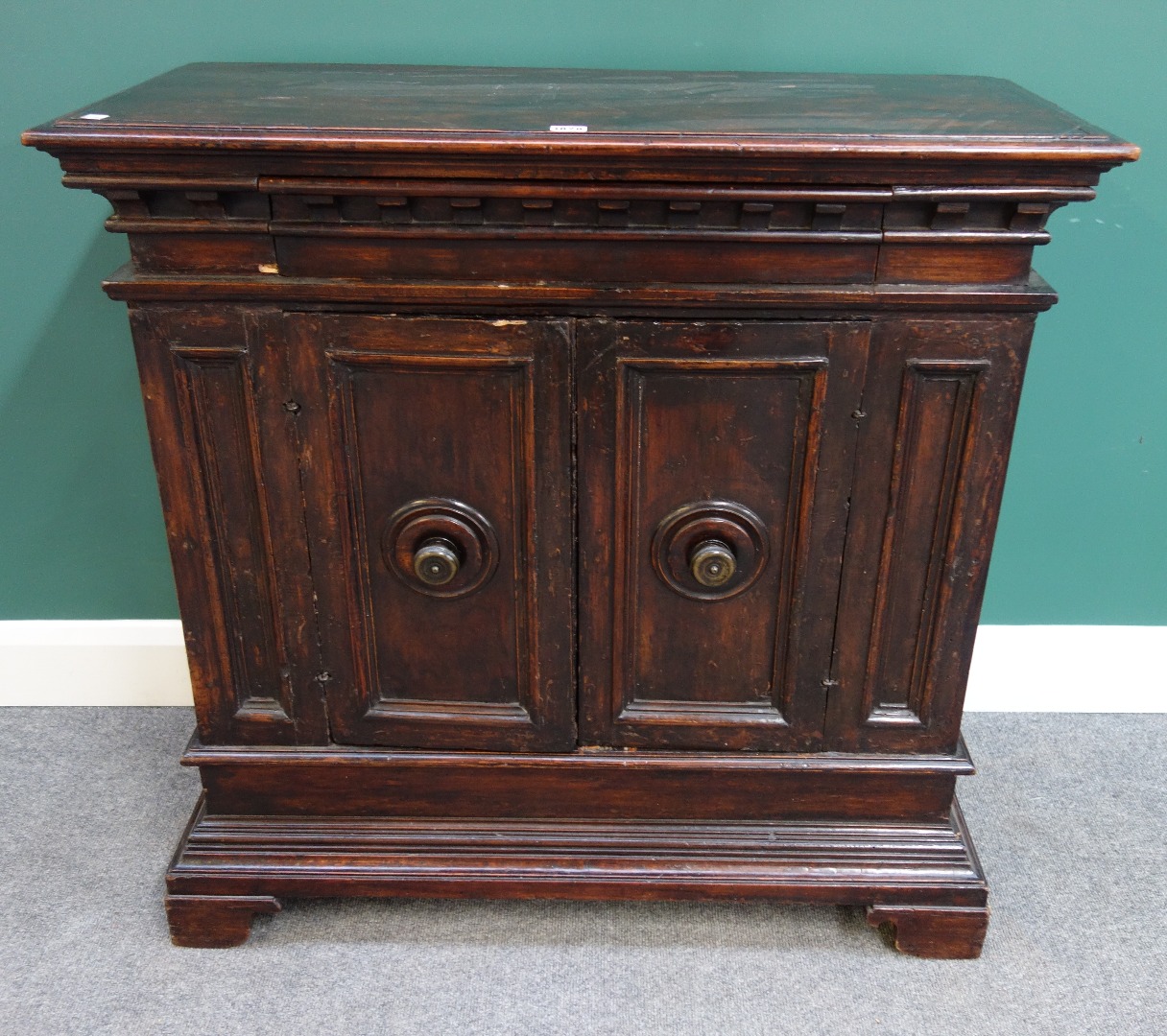 Appraisal: A th century Italian walnut side cabinet with single drawer