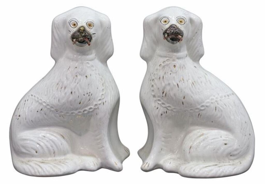 Appraisal: pair English Victorian Staffordshire mantel dogs th c seated spaniels