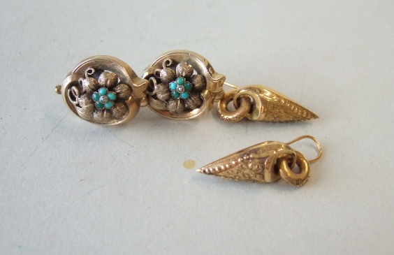 Appraisal: A pair of Victorian gold drop shaped earrings each in