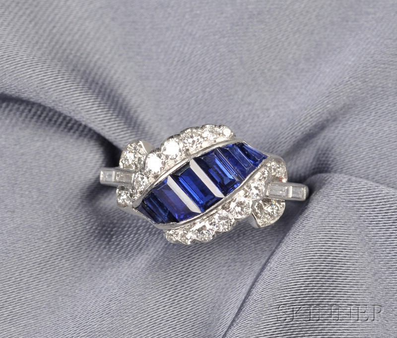 Appraisal: Platinum Sapphire and Diamond Ring the scroll motif channel-set with