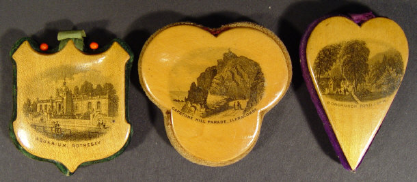 Appraisal: Three Mauchlin pincushions of clover leaf heart and shield shape