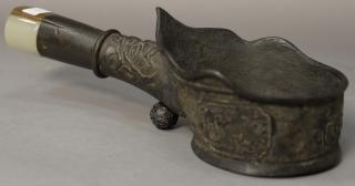 Appraisal: Chinese bronze iron having handle mounted with carved jade and