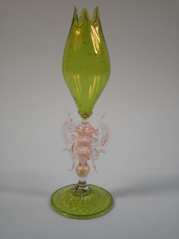 Appraisal: A Venetian glass bud vase in green with gilt inclusions