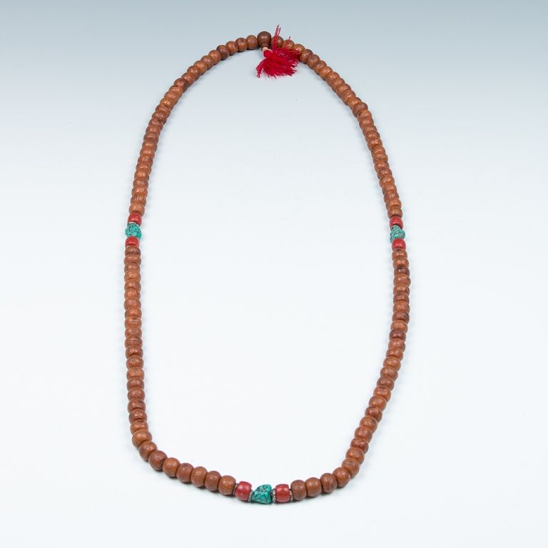 Appraisal: WOOD BEAD PRAYER NACKLACE Designed as a beads necklace comprising