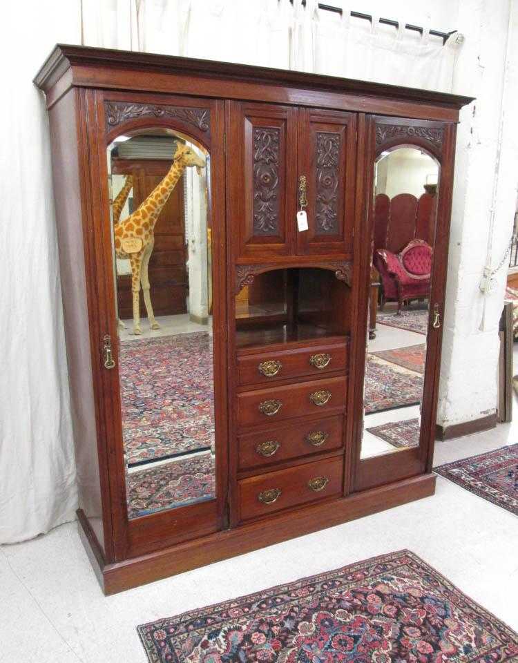 Appraisal: LARGE VICTORIAN WALNUT AND MAHOGANY WARDROBE English late th century