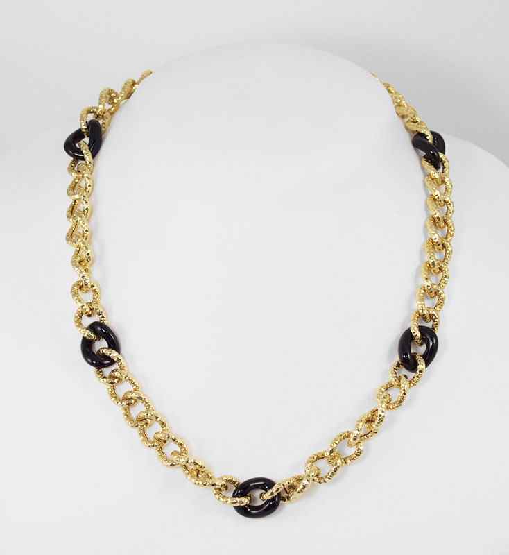 Appraisal: TWO K GOLD AND ONYX NECKLACES K yellow gold fancy