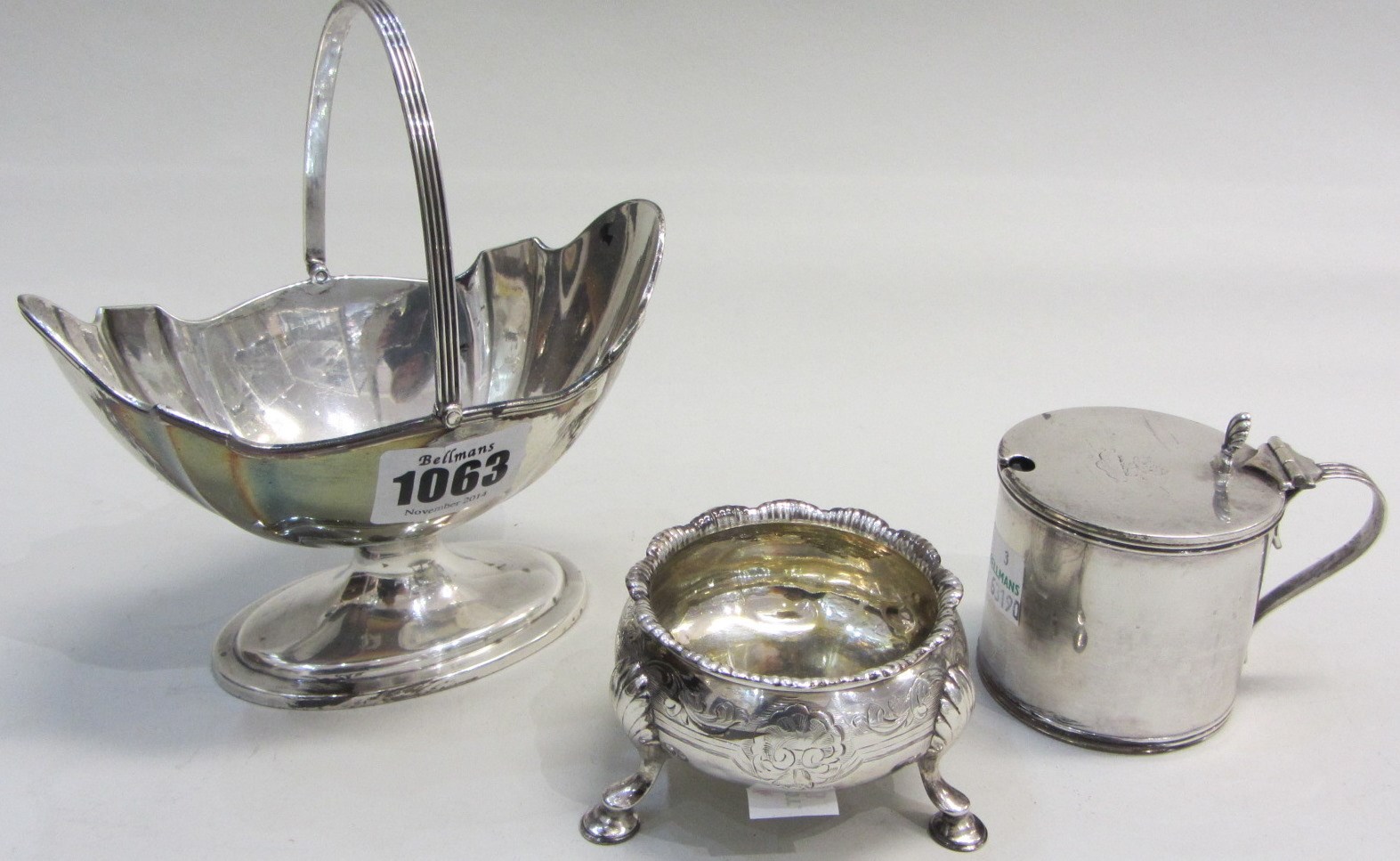 Appraisal: Silver comprising a shaped oval cream pail with a swing